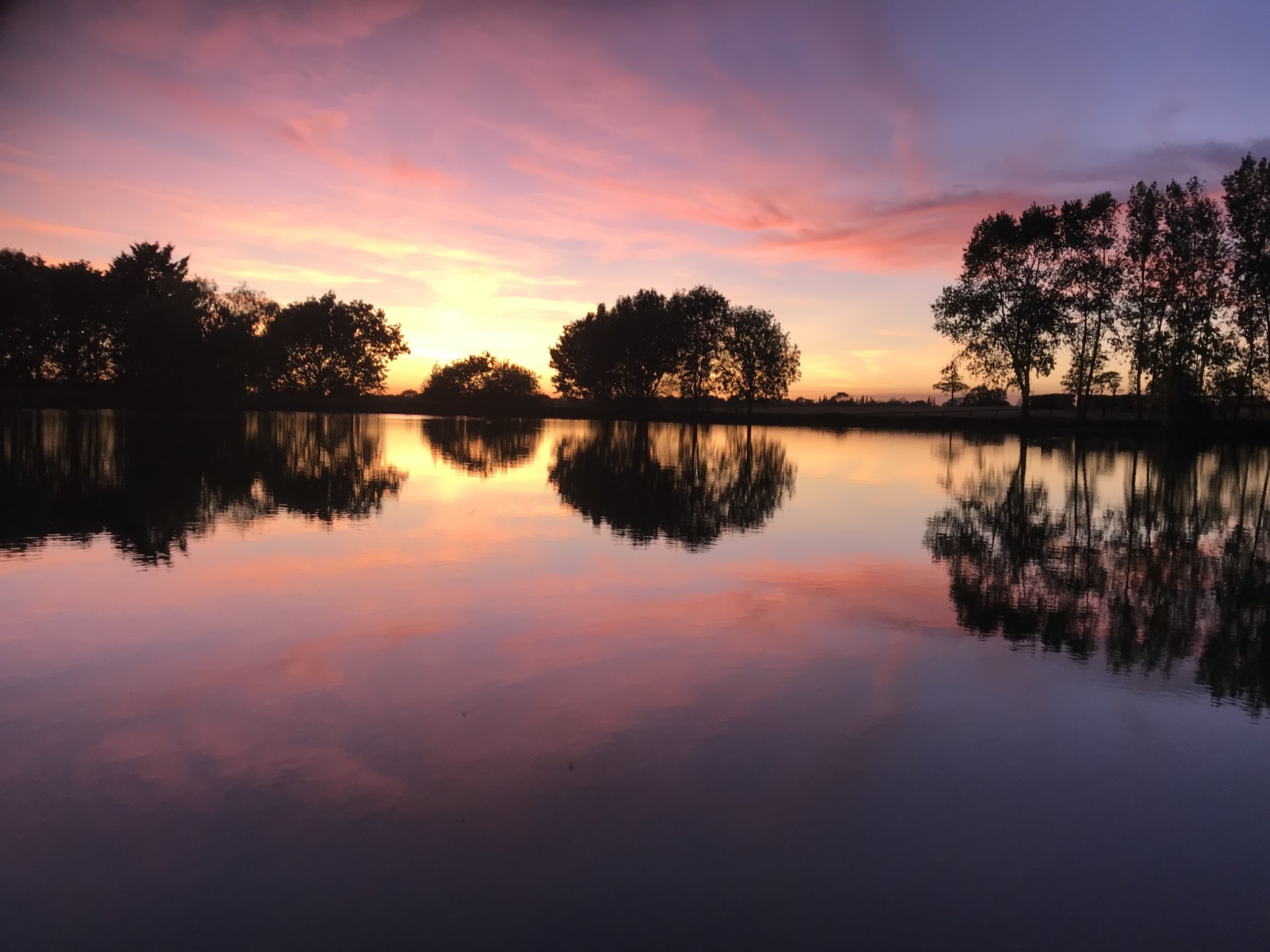 Beautiful June sunset over the lake