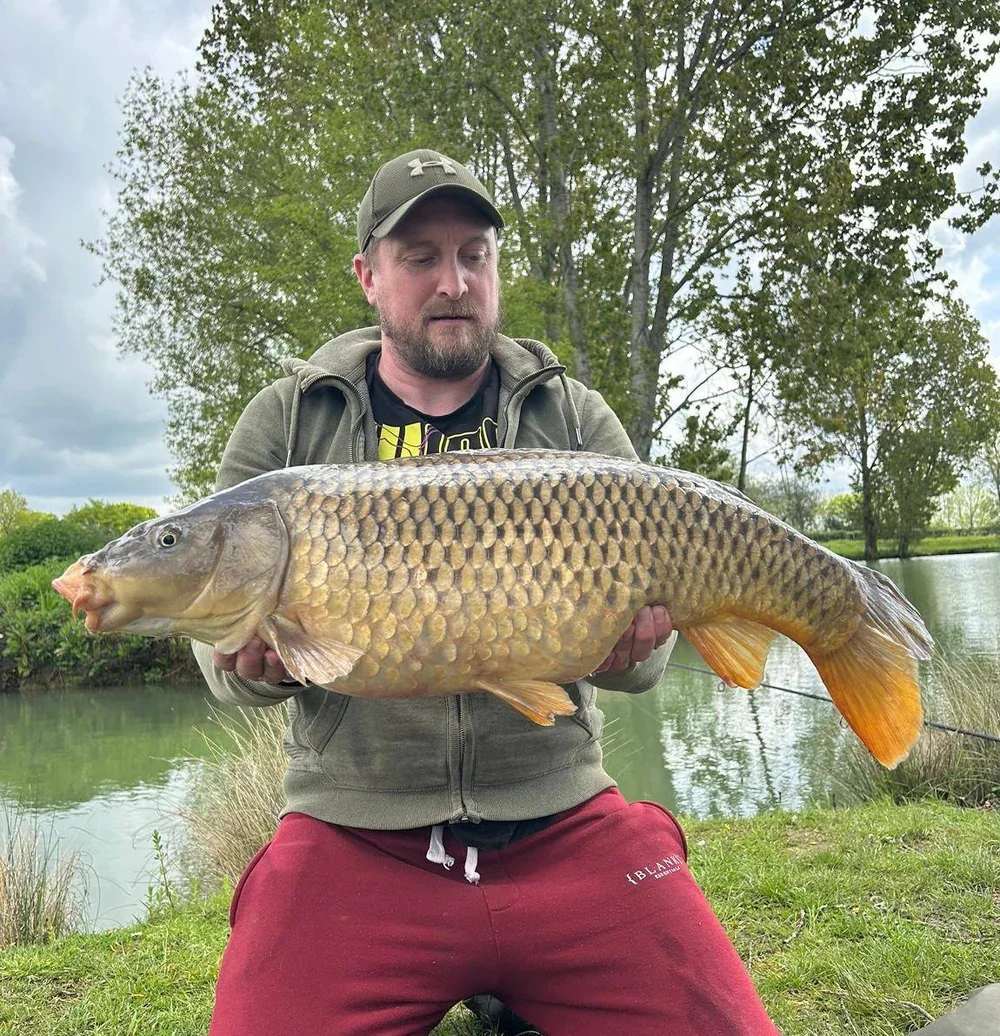This Common Carp is a good size, great catch!