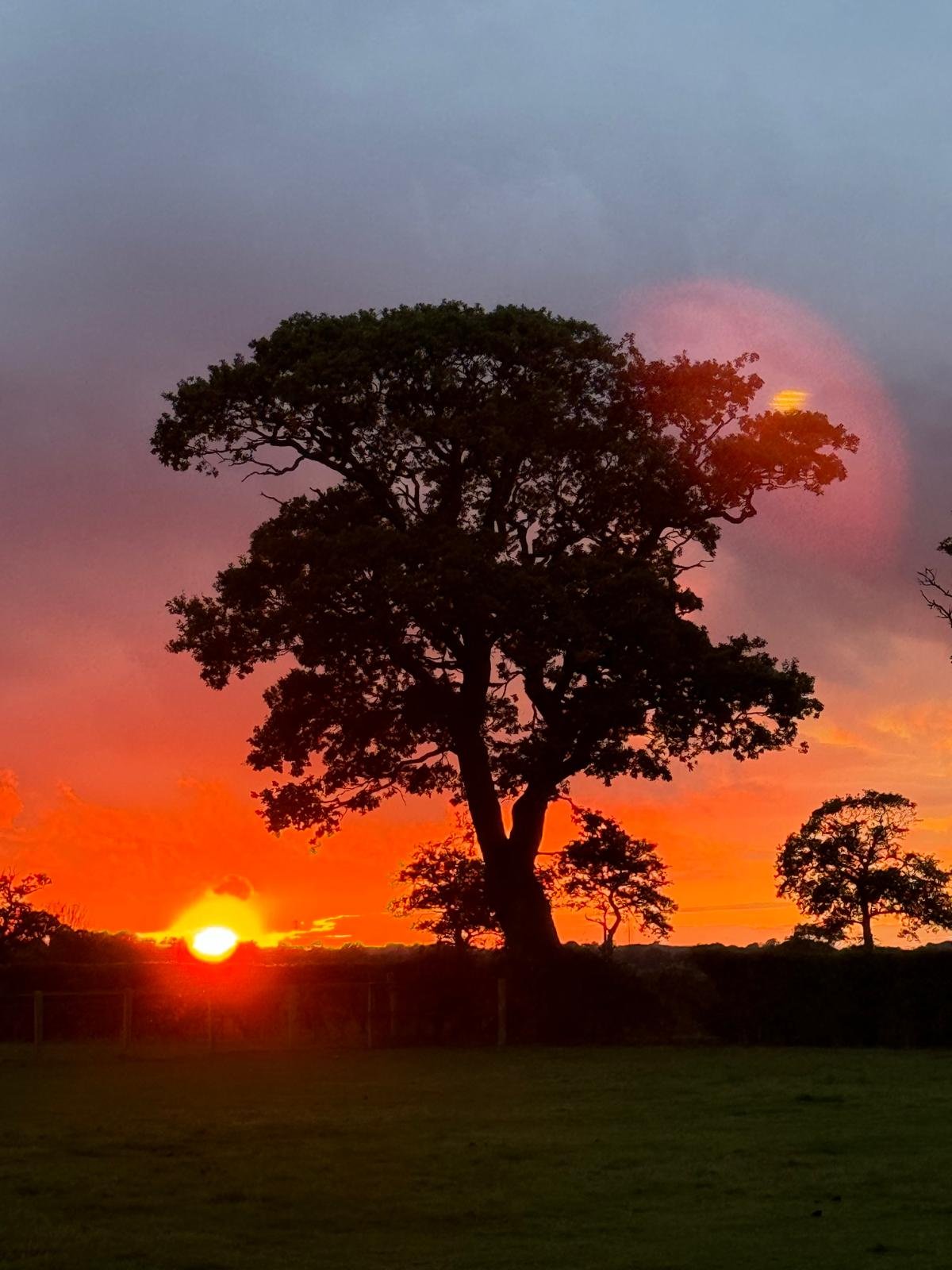 Sun dipping below the horizon