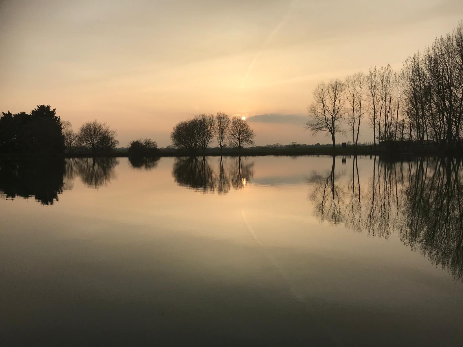 Dusk over the lake in spring 2025