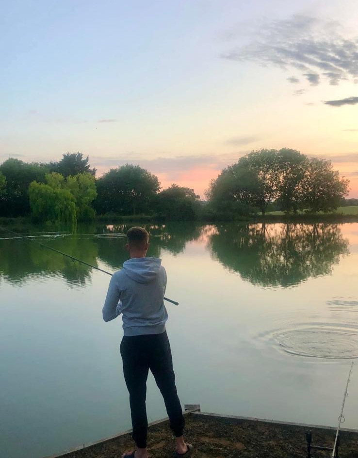 Peaceful evening fishing at Lodge Lake Fisheries